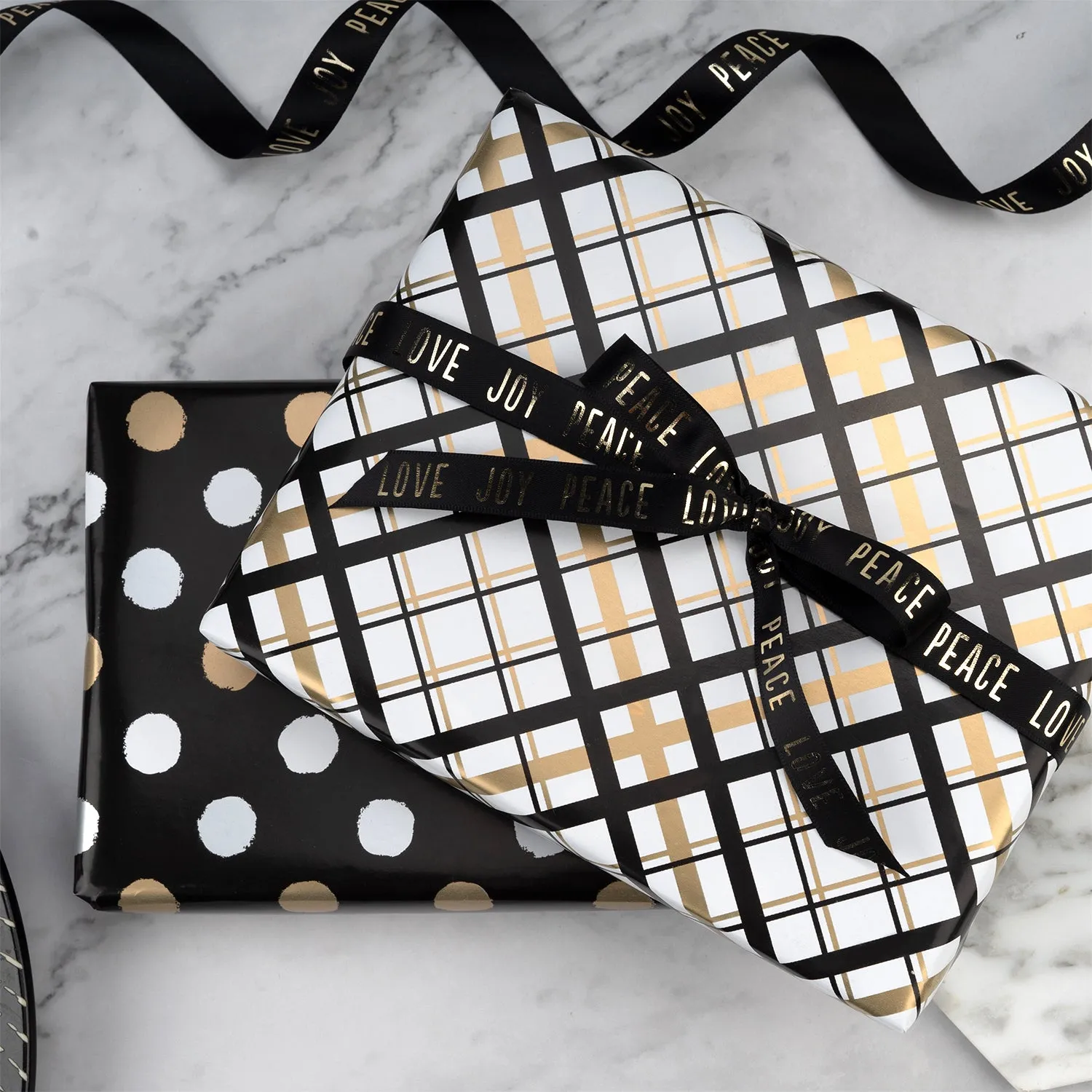Black & Gold Polka Dot Wrapping Paper with Plaid on Reverse