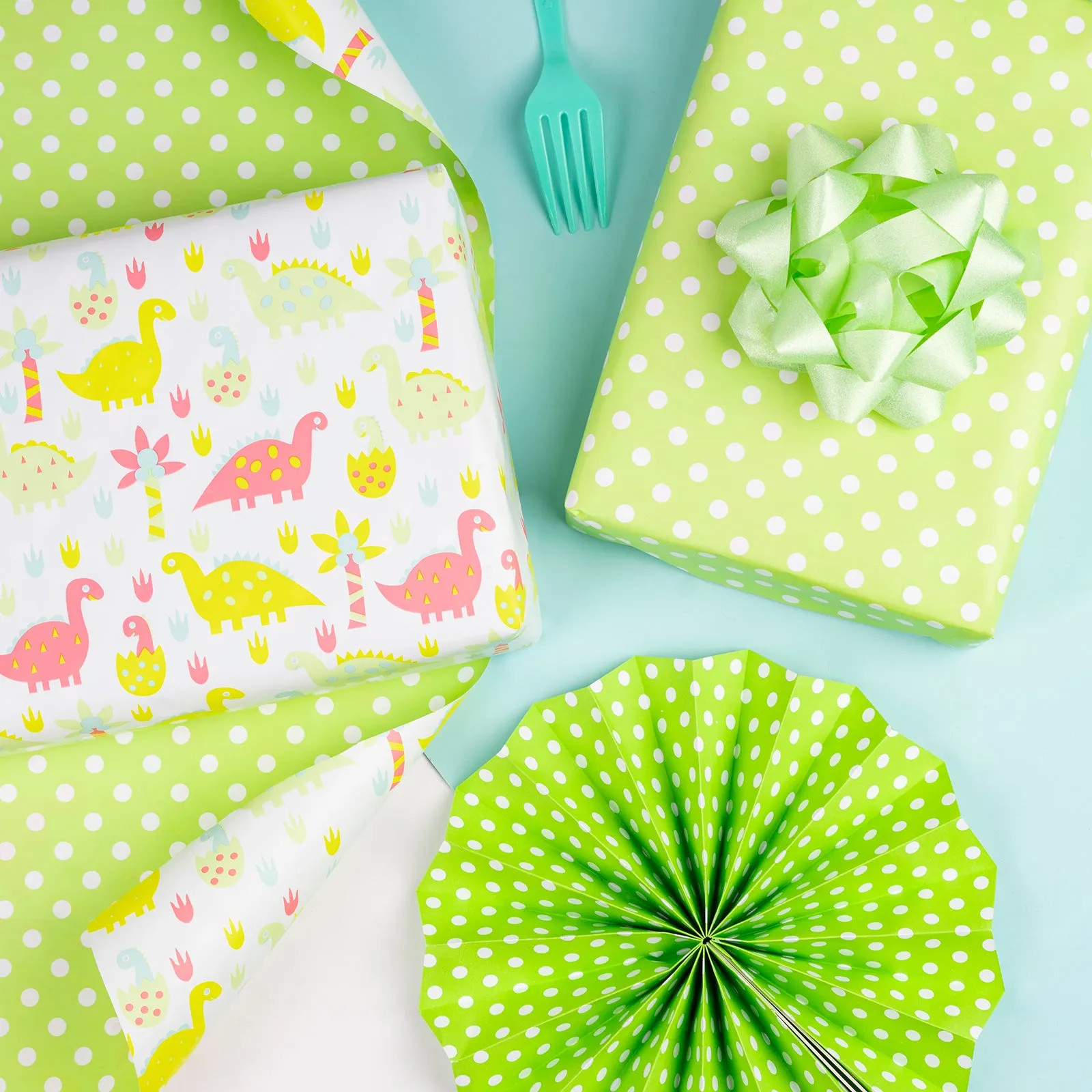 Cute Baby Dino Wrapping Paper with Green Polka Dot on Reverse
